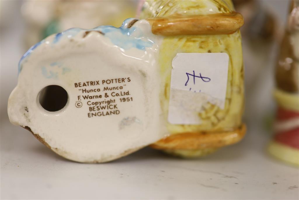 Seven Beswick Beatrix potter characters and five other ceramic models
